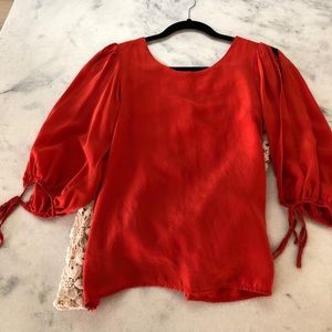 Adorable open shoulder/lace back shirt